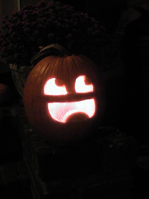 awesome_face_pumpkin_at_night_by_crazedhobbit.jpg